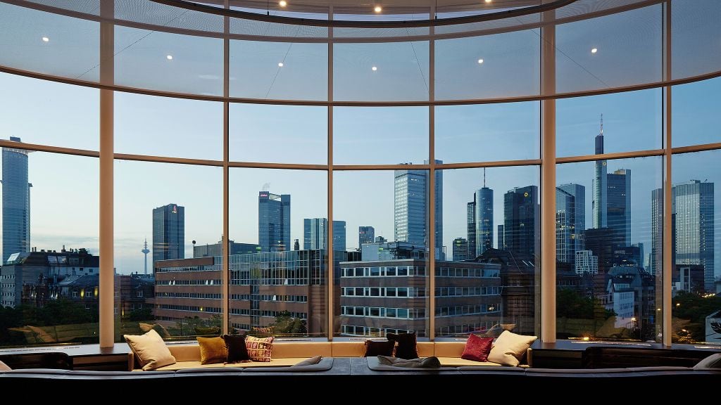 a view from inside Roomers, Frankfurt overlooking the city's skyscrapers