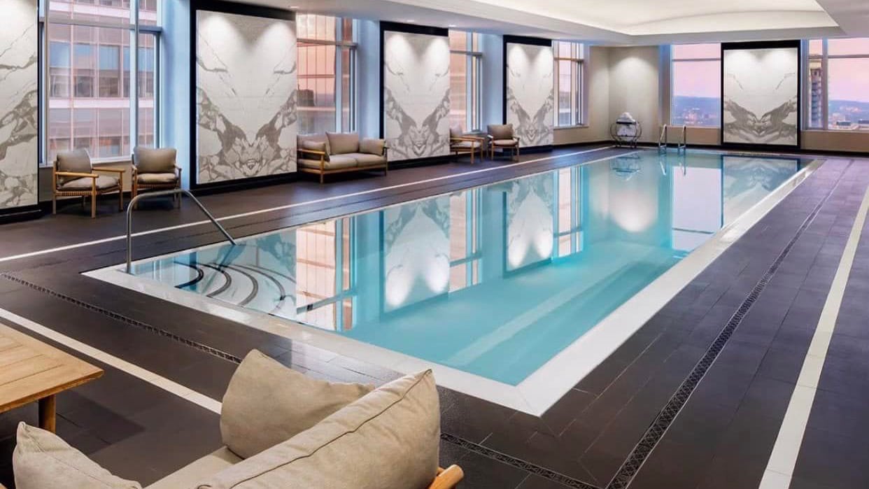 indoor swimming pool area at st regis Toronto