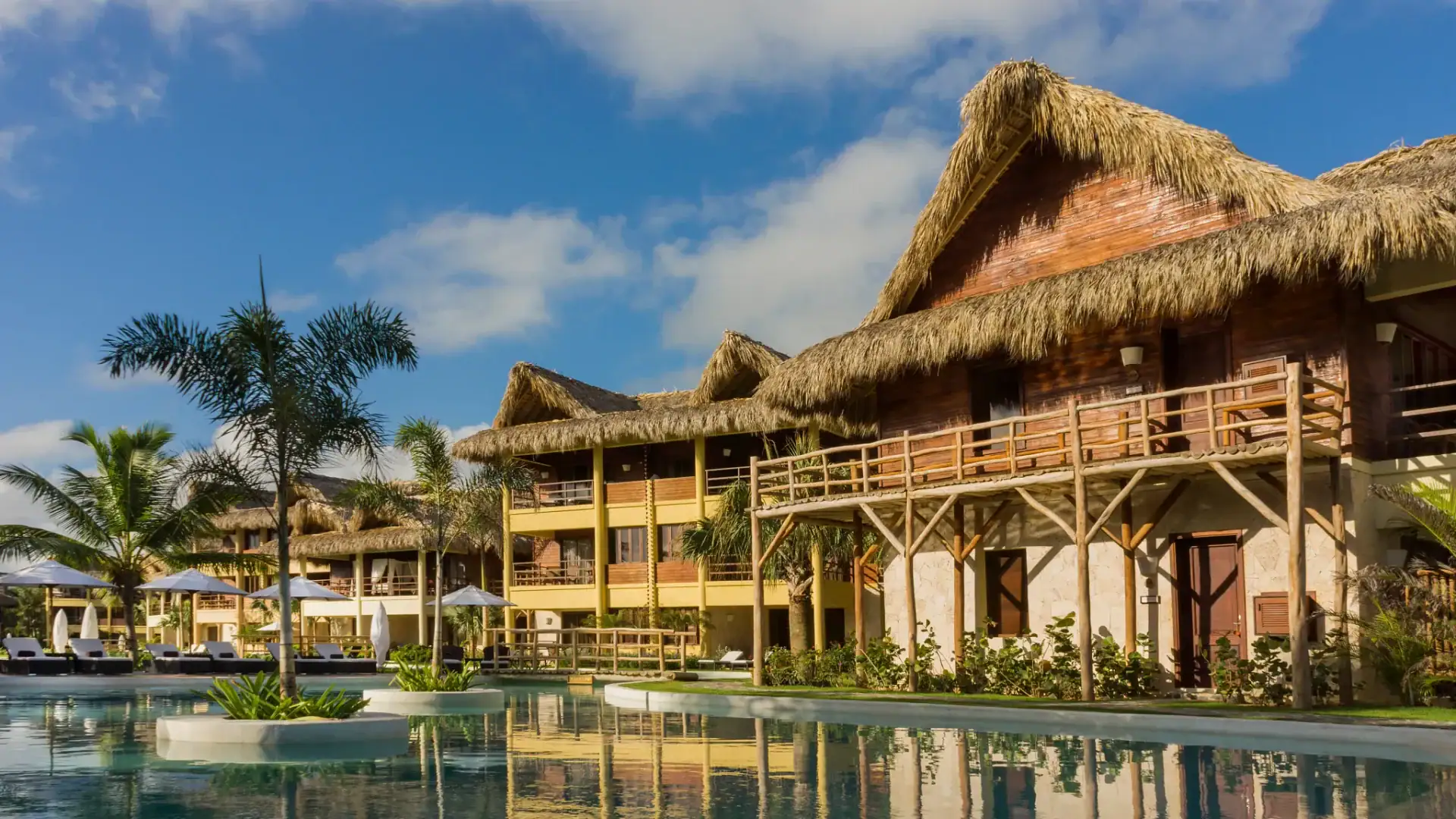 a room at the Zoëtry Agua Punta Cana in front of the swimming pool