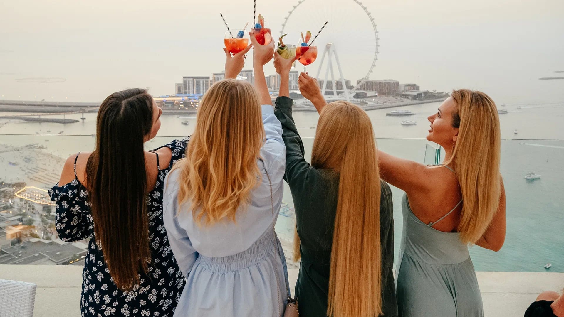 4 women celebrating at Pure Sky