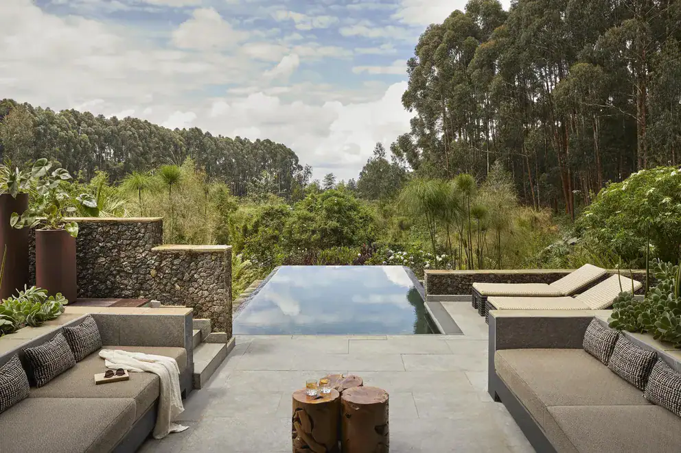 a suite's swiiming pool at One&Only Gorilla’s Nest