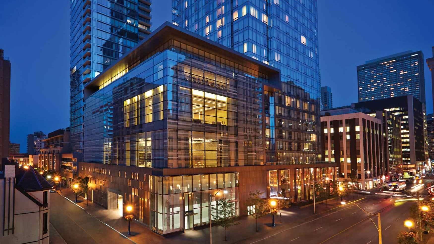 The Outside of four seasons hotel toronto made of glass